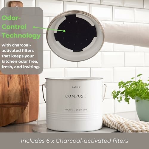 Compost bin with charcoal filters for odor control in a kitchen setting.