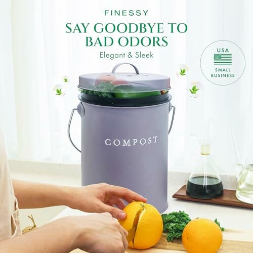 Compost bin on kitchen counter with vegetables and a person cutting an orange.