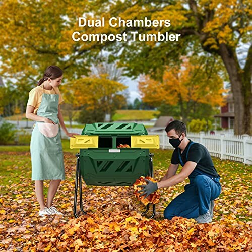 People using a dual chambers compost tumbler in a garden with autumn leaves.