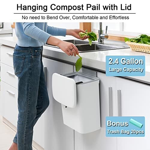 Person using a hanging compost pail in a kitchen