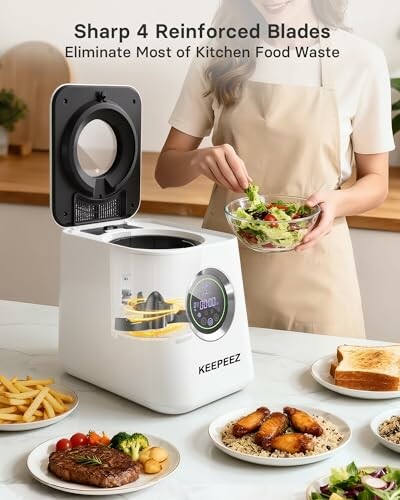 Person using a food waste composter in a kitchen setting.